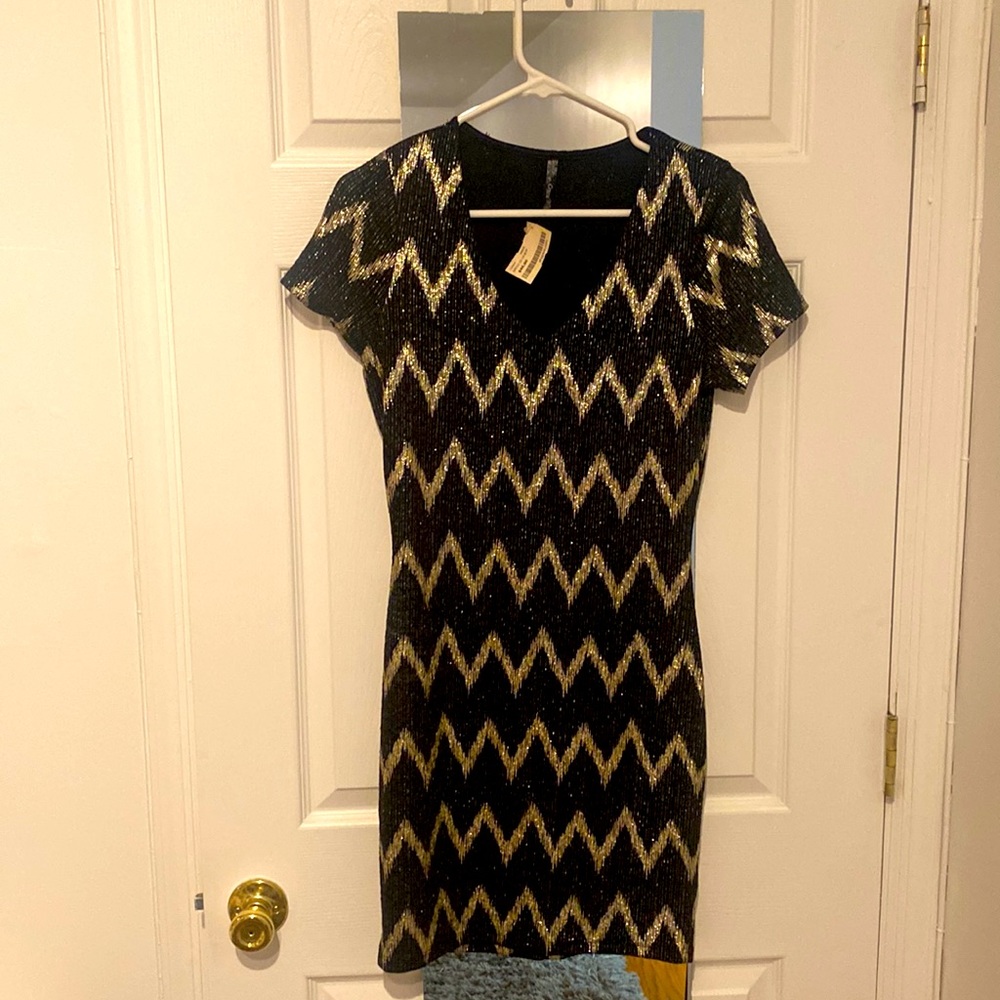 Woman’s new with tags Black Gold Mini Dress - brand Crece - Medium
